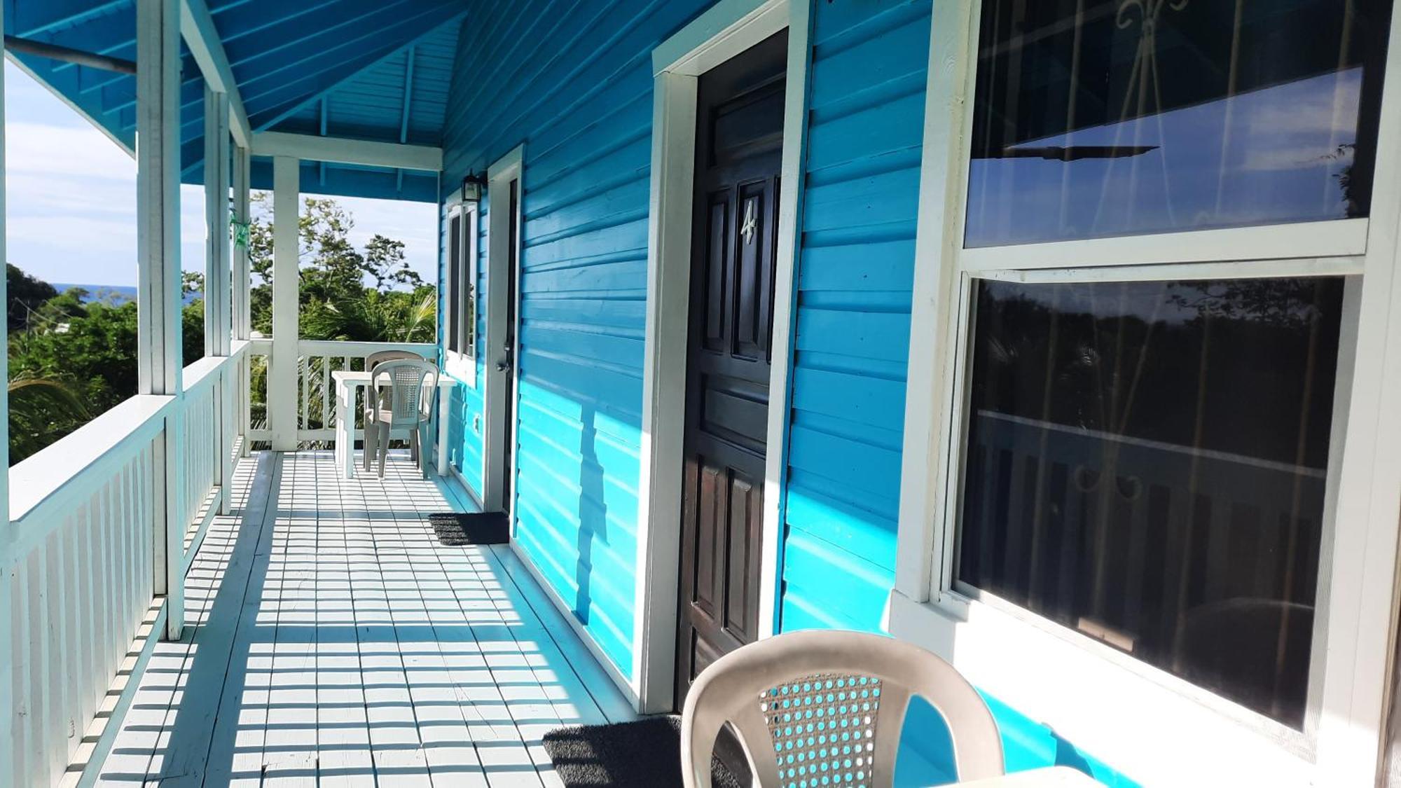 Guava Grove Resort & Villas Sandy Bay Room photo